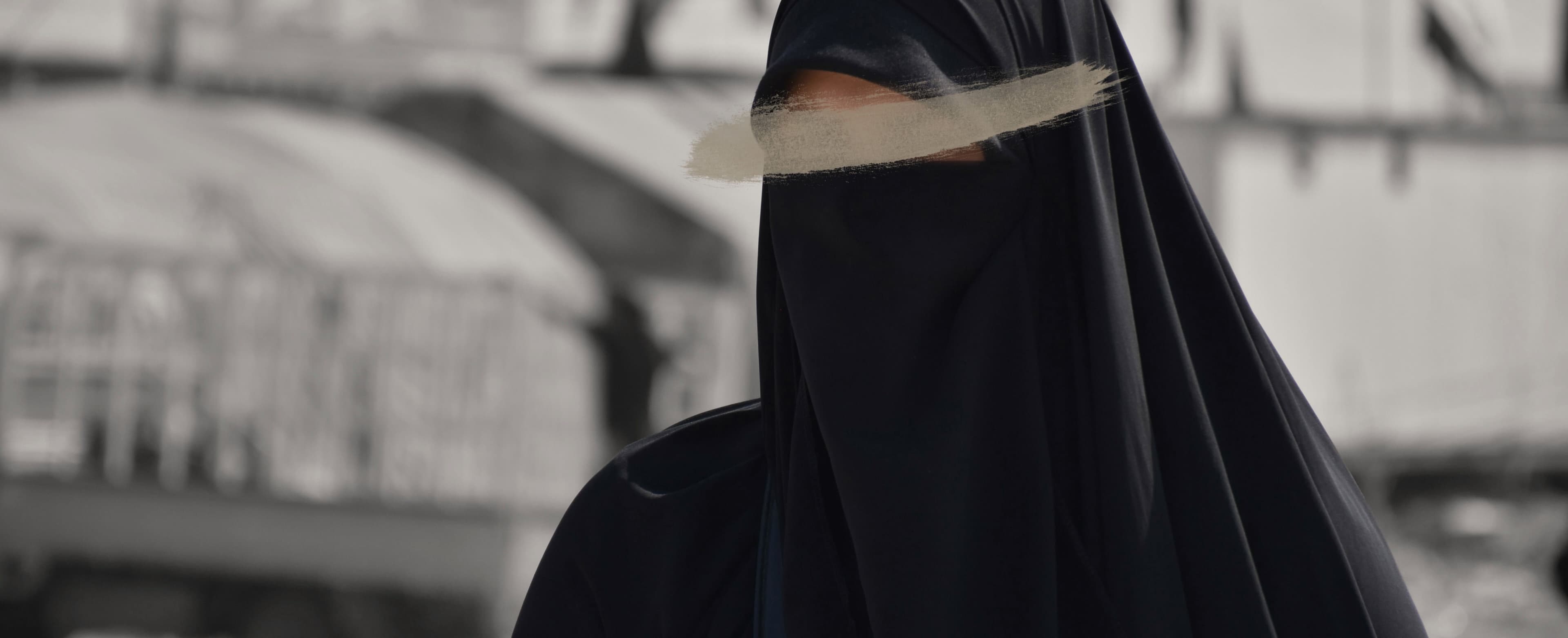 Woman wearing jilbāb and niqāb