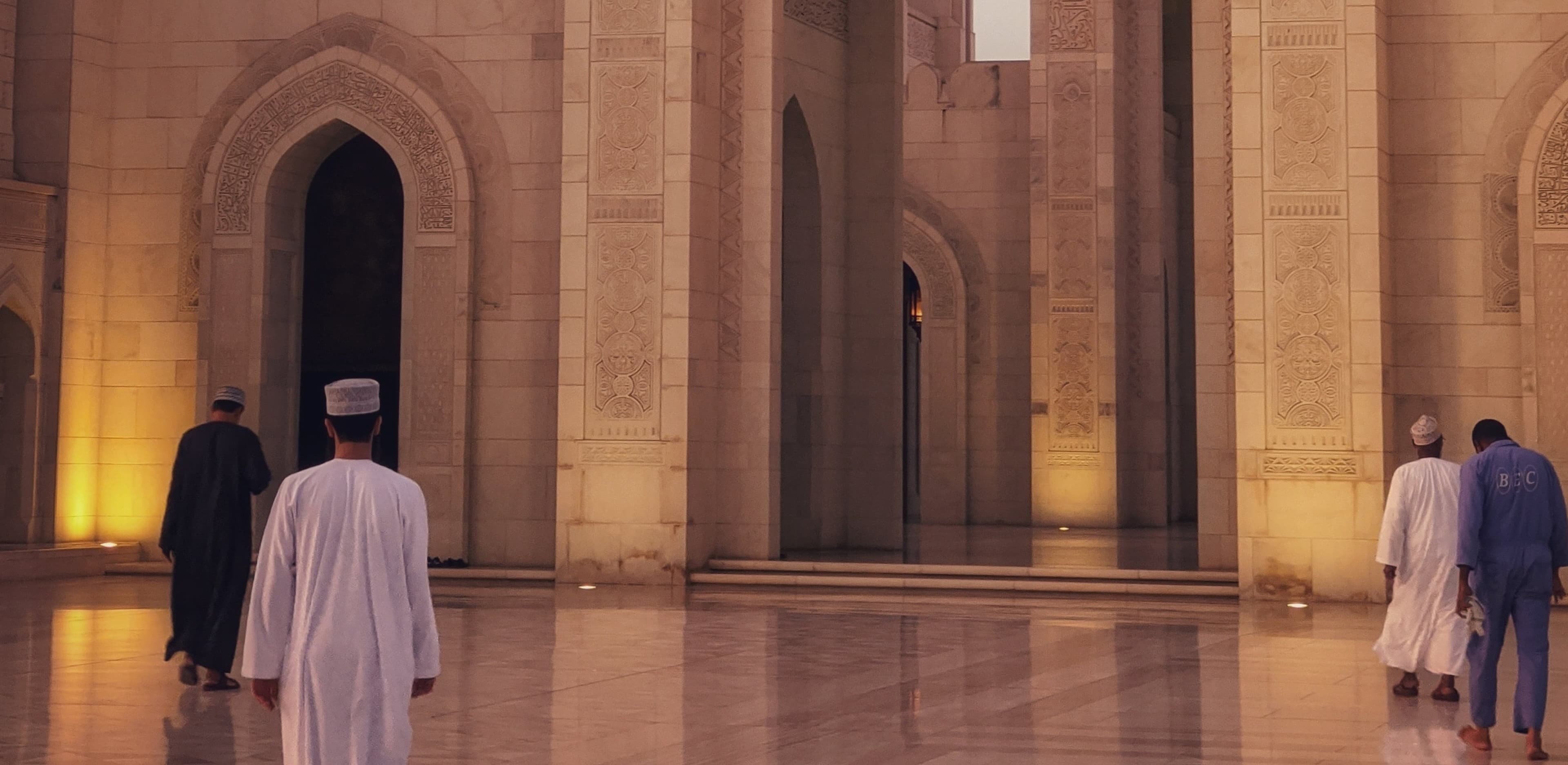 Muslim men entering the masjid