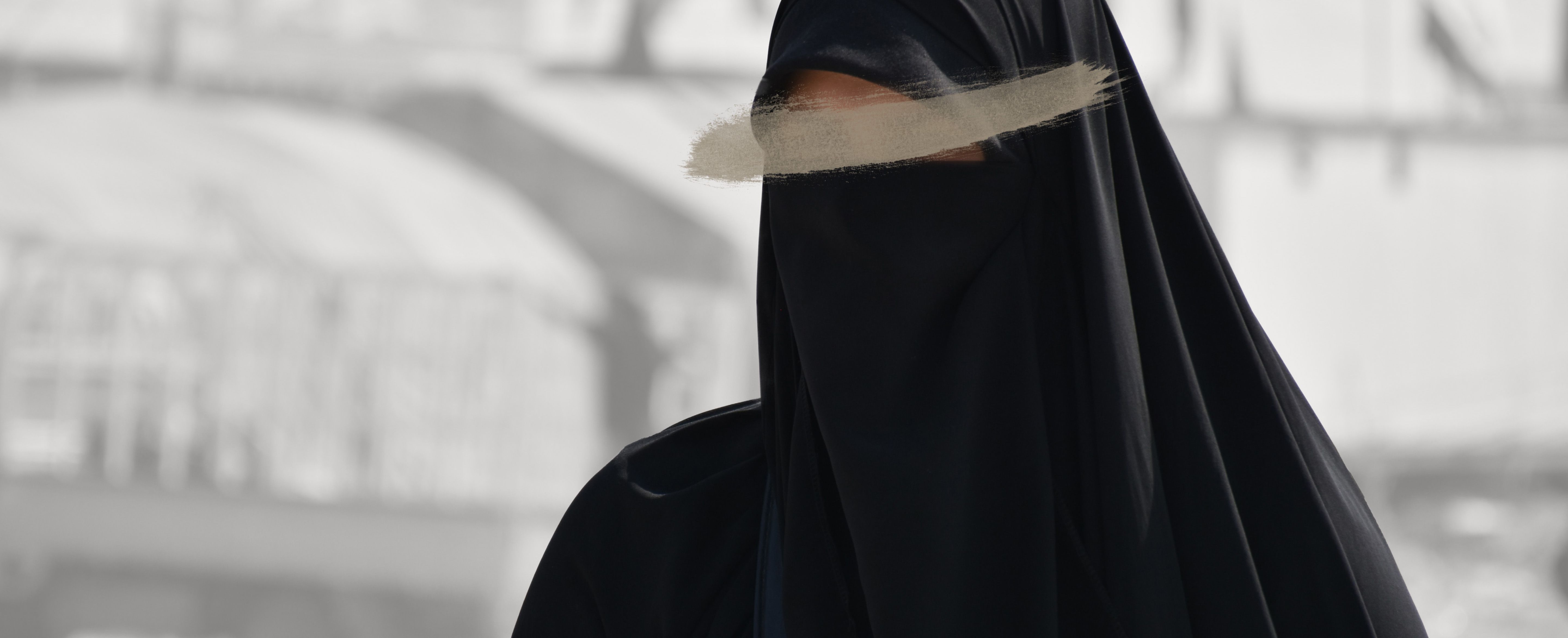 Woman wearing jilbāb and niqāb